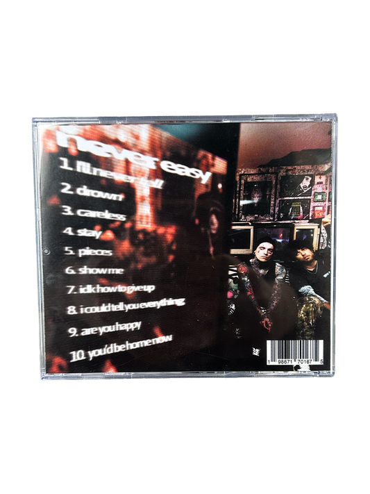 it never gets easier cd (signed)