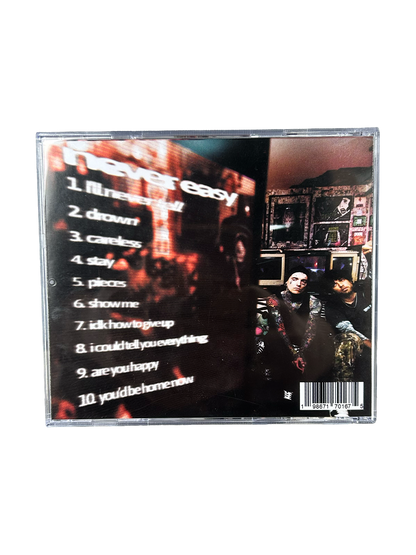 it never gets easier cd (signed)